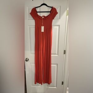 In Loom: Orange Off-Shoulder Jumpsuit